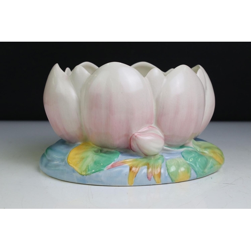 91 - Clarice Cliff Moulded Water Lily Bowl, 21cm long together with a Poole Pottery Shallow Bowl decorate... 