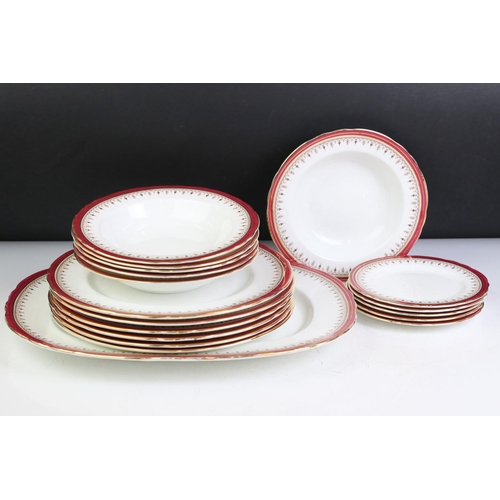 95 - Aynsley Bone China Dinner and Tea ware decorated with red deep borders and gilt highlights including... 