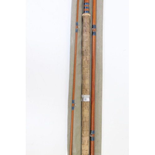 391 - Two vintage split cane fishing rods in original rod bags to include a Hardy example