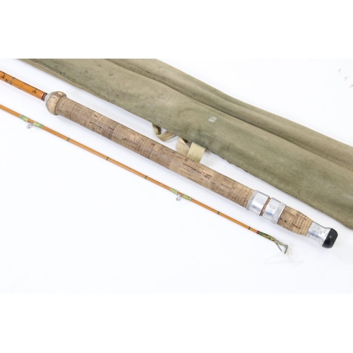 391 - Two vintage split cane fishing rods in original rod bags to include a Hardy example