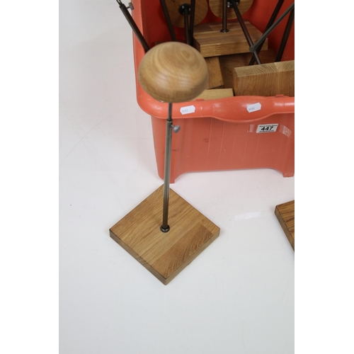 447 - Twelve Shop Display Adjustable Hat / Wig Stands, some with oak mushroom tops and all with square oak... 