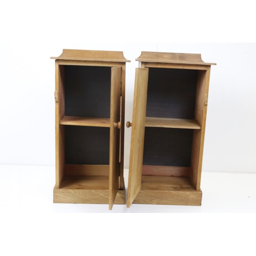 564 - Pair of pine bedside cupboards, each 34cm wide x 67cm high