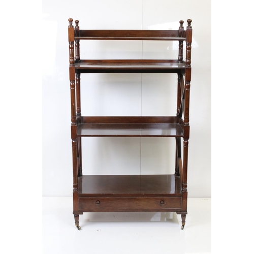 565 - Early 19th century Mahogany Whatnot, the three shelves with turned supports above a single drawer, r... 