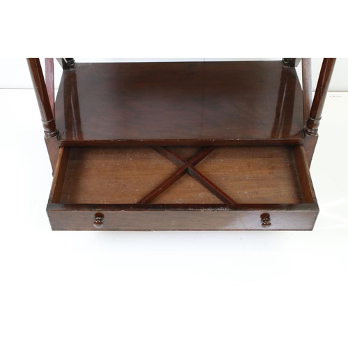 565 - Early 19th century Mahogany Whatnot, the three shelves with turned supports above a single drawer, r... 