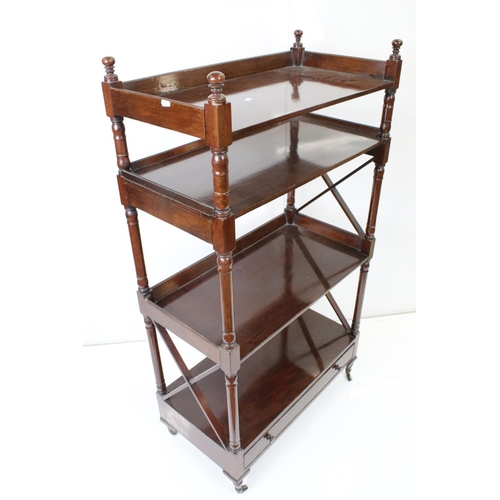 565 - Early 19th century Mahogany Whatnot, the three shelves with turned supports above a single drawer, r... 