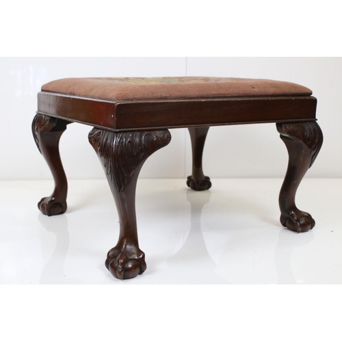 575 - George II style carved mahogany stool, the rectangular needlepoint drop in seat on leaf carved cabri... 