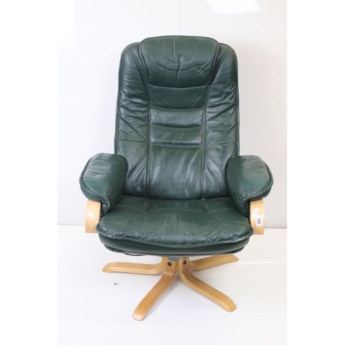 586 - Swedish Mobel Team ' The Easy Chair ' Swivel Lounge Chair with matching footstool, both upholstered ... 