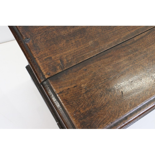 604 - 18th century Oak Coffer decorated with applied panels (possibly later), raised on bracket feet, 128c... 