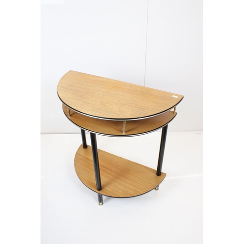 542 - Two 1950's / 1960's Teak and Ebonised Side Tables, one of triangular form, 77cm wide x 58cm high and... 