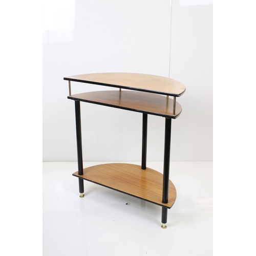 542 - Two 1950's / 1960's Teak and Ebonised Side Tables, one of triangular form, 77cm wide x 58cm high and... 