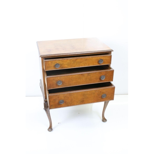 569 - Early 20th century Burr Walnut Chest of Three Long Drawers in the Queen Anne style raised on cabriol... 