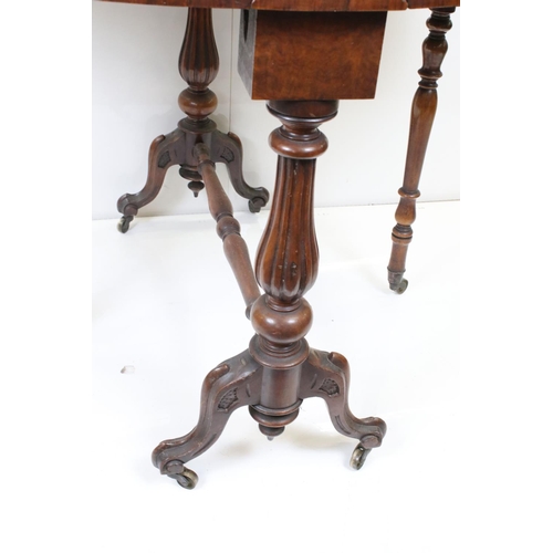 591 - Victorian Burr Walnut and Walnut Oval Sutherland Table raised on reeded bulbous supports and castors... 