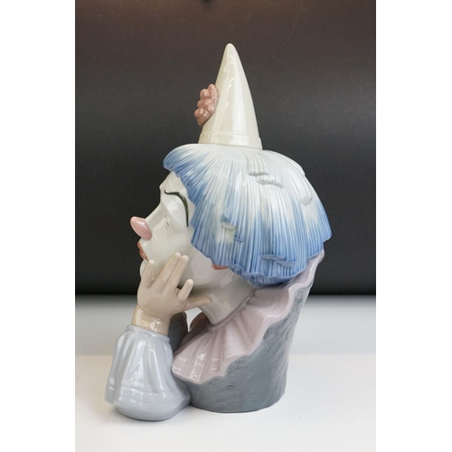 12 - Lladro Jester bust figure, model no. 5129, 30.5cm high, raised on a wooden base