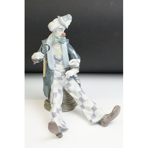 17 - Lladro ' Checking The Time ' porcelain clown figure, model no. 5762, 24cm tall