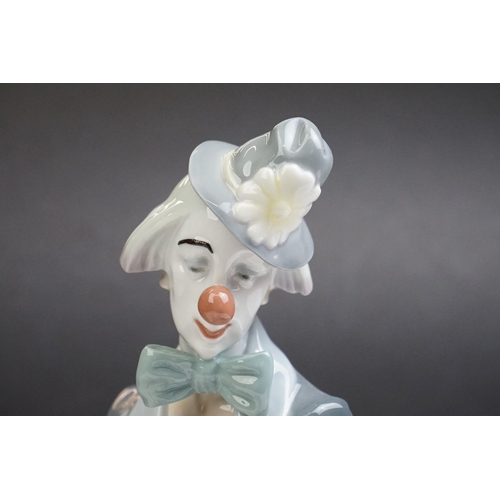 17 - Lladro ' Checking The Time ' porcelain clown figure, model no. 5762, 24cm tall