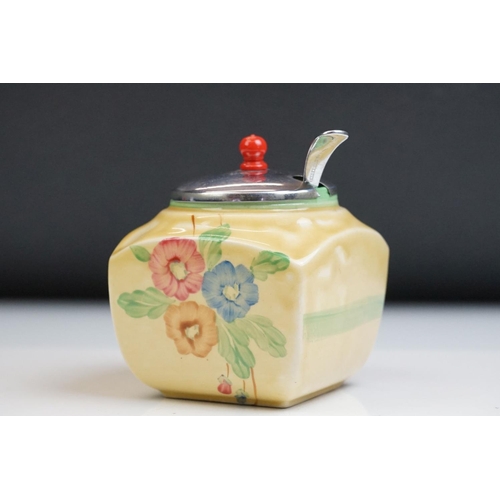 18 - Clarice Cliff for Newport Pottery - Preserve jar with floral and green banding decoration, on a must... 