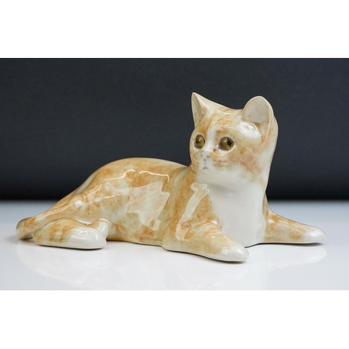 19 - Winstanley pottery figure of a recumbent Ginger Tabby Cat, size 3, signed to base, approx 23cm long