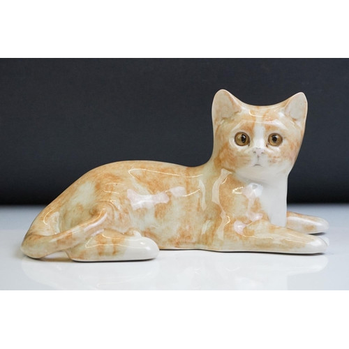 19 - Winstanley pottery figure of a recumbent Ginger Tabby Cat, size 3, signed to base, approx 23cm long