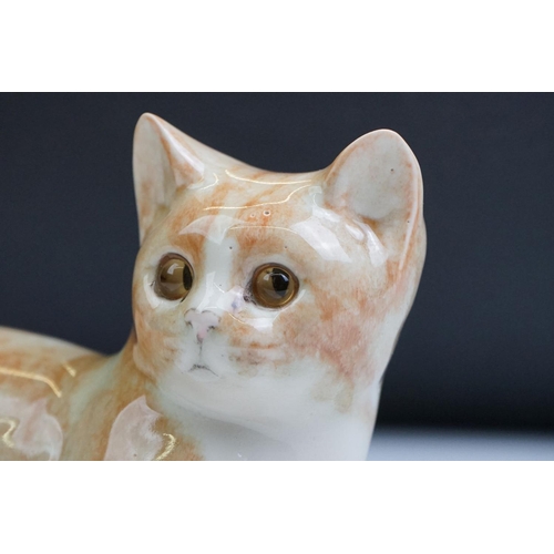 19 - Winstanley pottery figure of a recumbent Ginger Tabby Cat, size 3, signed to base, approx 23cm long