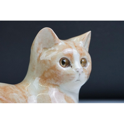 19 - Winstanley pottery figure of a recumbent Ginger Tabby Cat, size 3, signed to base, approx 23cm long