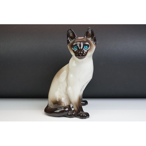 22 - Winstanley pottery model of a Seated Siamese Cat, with blue glass eyes, marked ' Kensington 32 Winst... 