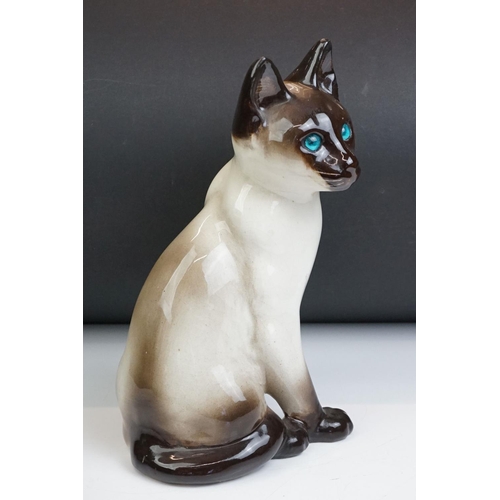 22 - Winstanley pottery model of a Seated Siamese Cat, with blue glass eyes, marked ' Kensington 32 Winst... 