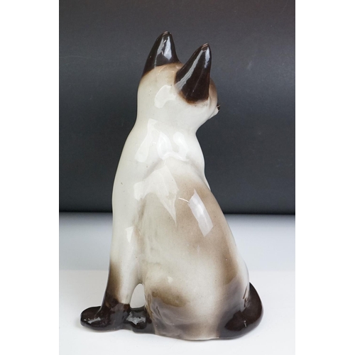 22 - Winstanley pottery model of a Seated Siamese Cat, with blue glass eyes, marked ' Kensington 32 Winst... 