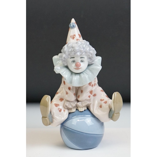 23 - Three Lladro porcelain clown figures to include 5813 ' Having A Ball ', 5279 ' Pierrot With Concerti... 