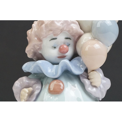 23 - Three Lladro porcelain clown figures to include 5813 ' Having A Ball ', 5279 ' Pierrot With Concerti... 