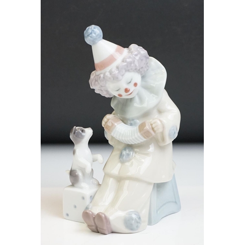 23 - Three Lladro porcelain clown figures to include 5813 ' Having A Ball ', 5279 ' Pierrot With Concerti... 