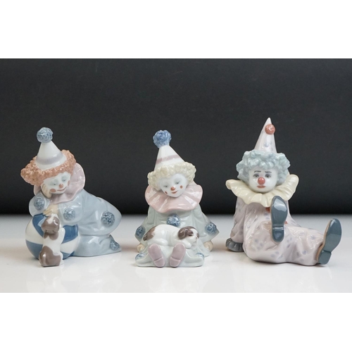 25 - Three Lladro porcelain clown figures to include 5277 Pierrot With Puppy, 5812 Tired Friend and 5278 ... 