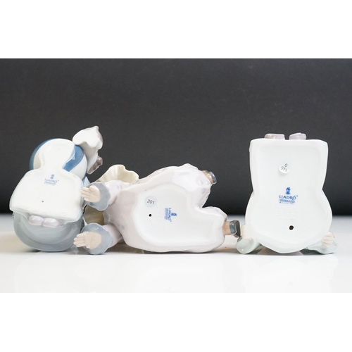 25 - Three Lladro porcelain clown figures to include 5277 Pierrot With Puppy, 5812 Tired Friend and 5278 ... 