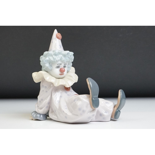 25 - Three Lladro porcelain clown figures to include 5277 Pierrot With Puppy, 5812 Tired Friend and 5278 ... 