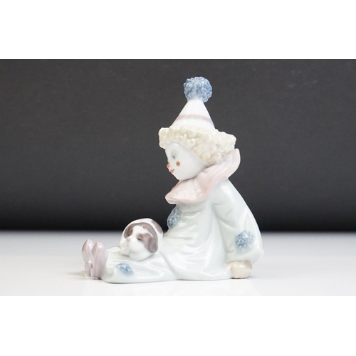 25 - Three Lladro porcelain clown figures to include 5277 Pierrot With Puppy, 5812 Tired Friend and 5278 ... 