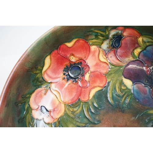 3 - William Moorcroft ' Anemone ' pattern fruit bowl on green/brown ground, impressed marks & paper labe... 