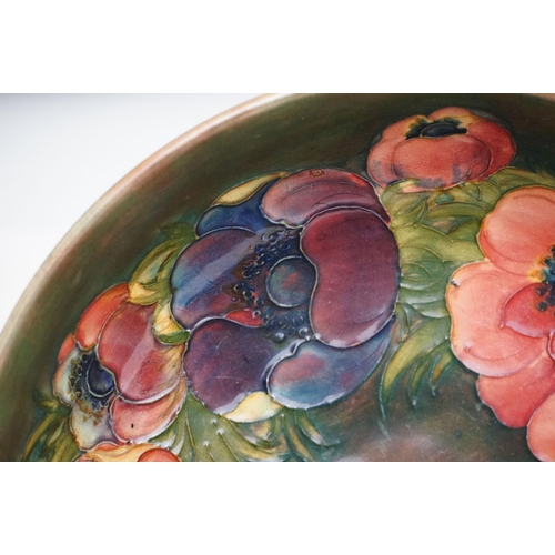 3 - William Moorcroft ' Anemone ' pattern fruit bowl on green/brown ground, impressed marks & paper labe... 