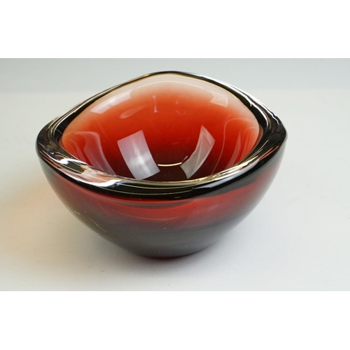 38 - Whitefriars Green Glass Bubble Control Lipped Bowl, 10cm diameter together with two Red Glass Bowls