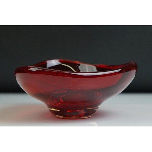 38 - Whitefriars Green Glass Bubble Control Lipped Bowl, 10cm diameter together with two Red Glass Bowls