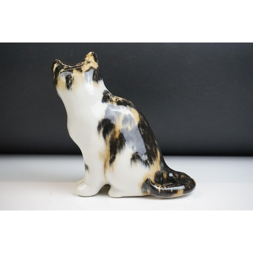 4 - Winstanley pottery figure of a seated tabby cat with glass eyes, size 2, signed Winstanley to base, ... 