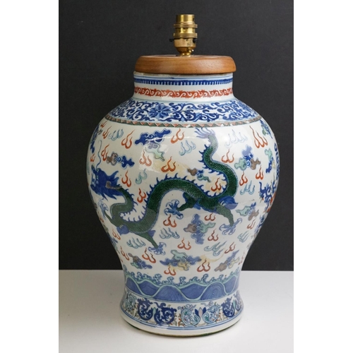 50 - Chinese Porcelain Bulbous Jar decorated in the Wucai palette with dragons, Qianlong four chararcter ... 