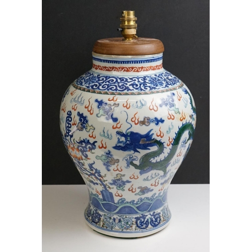 50 - Chinese Porcelain Bulbous Jar decorated in the Wucai palette with dragons, Qianlong four chararcter ... 