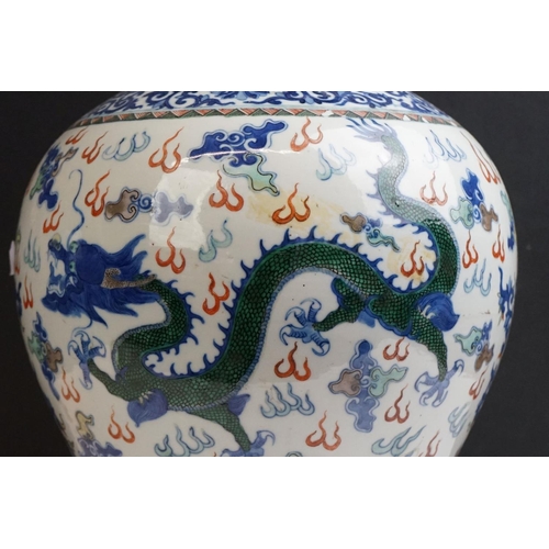 50 - Chinese Porcelain Bulbous Jar decorated in the Wucai palette with dragons, Qianlong four chararcter ... 