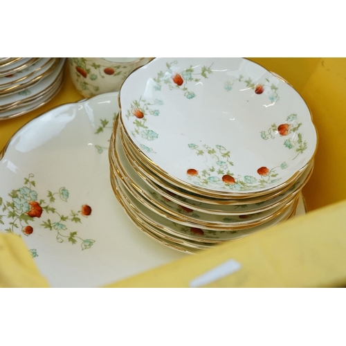 52 - Royal Albert Crown China part Tea Set decorated with red and pale blue flowers comprising 6 tea cups... 