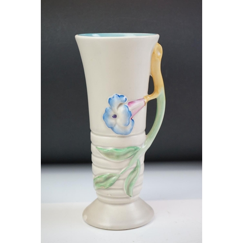 55 - Clarice Cliff Vase with moulded relief flower decoration, shape no. 905, 22cm high together with a W... 