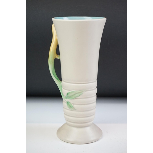 55 - Clarice Cliff Vase with moulded relief flower decoration, shape no. 905, 22cm high together with a W... 