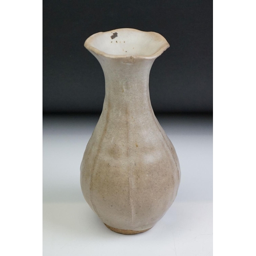 67 - Katherine Pleydell-Bouverie (1895-1985) Eight items of Stoneware including a fluted vase 17cm high, ... 