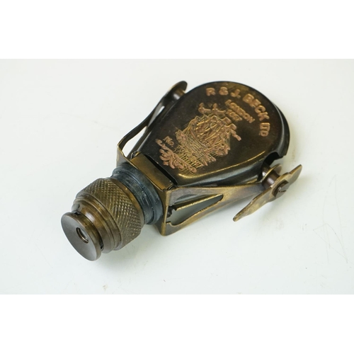 200 - Brass cased powder flask with miniature telescope