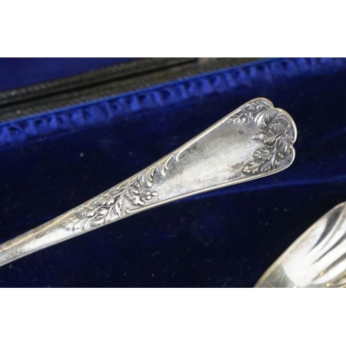 202 - A cased set of six hallmarked sterling silver tea spoons together with a cased pair of fully hallmar... 