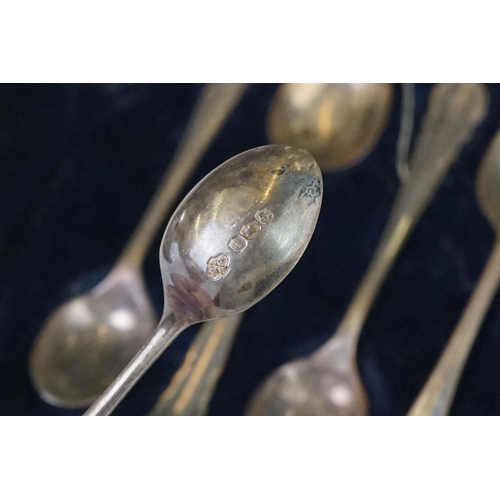 202 - A cased set of six hallmarked sterling silver tea spoons together with a cased pair of fully hallmar... 