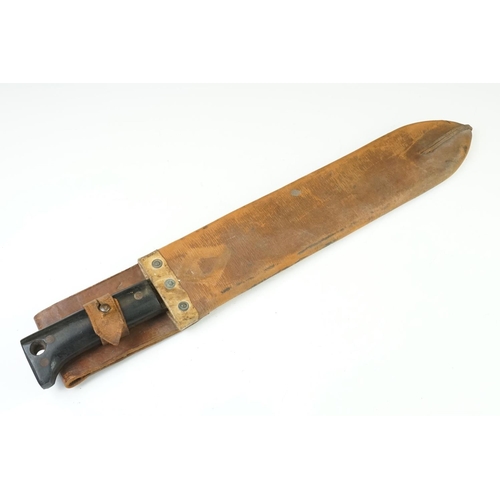 207 - A British military issued World War Two machete with leather scabbard, dated 1944 and broad arrow ma... 